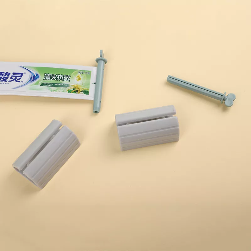 Espremedor giratório de pasta de dente infantil